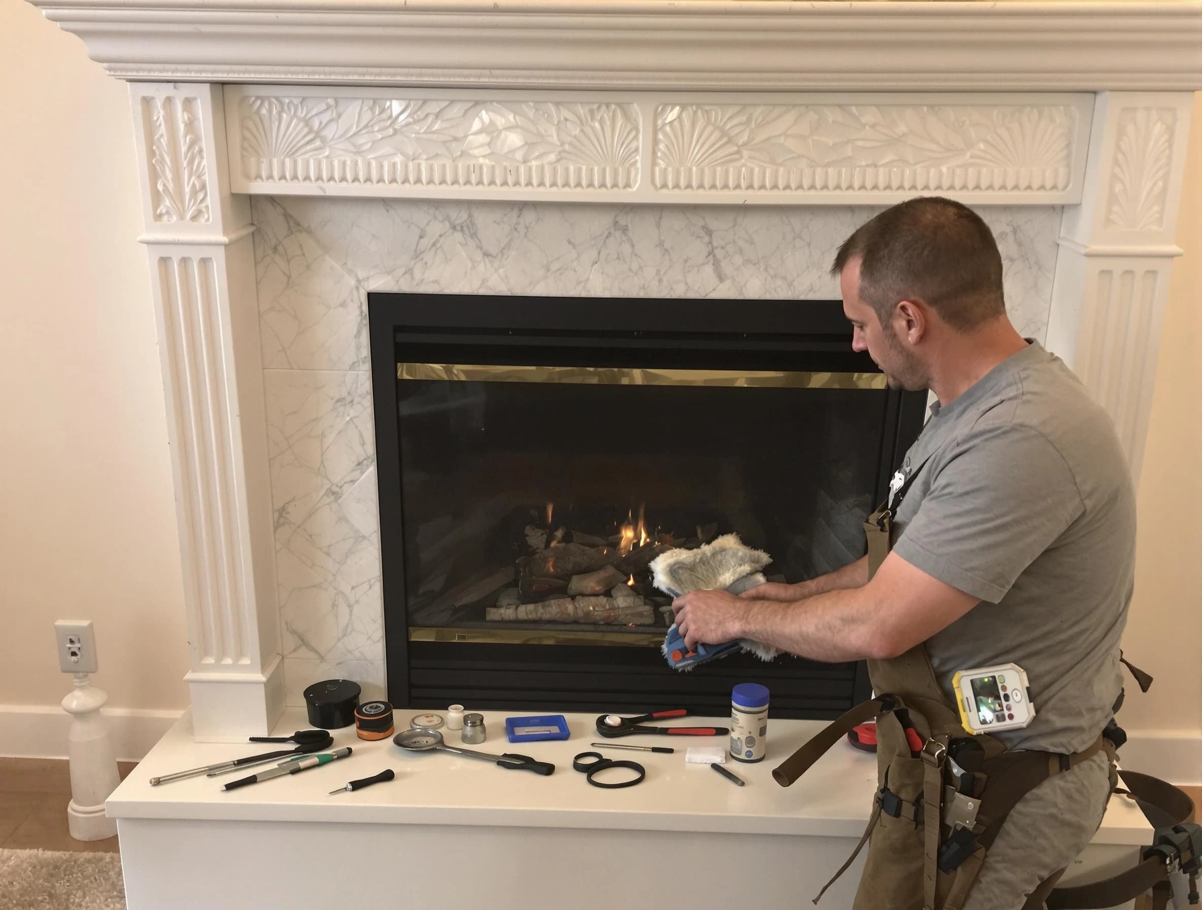 Rostraver Chimney Sweep performing fireplace maintenance in Rostraver, PA